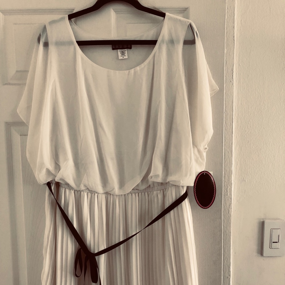 Plus size white blouson pleated dress.